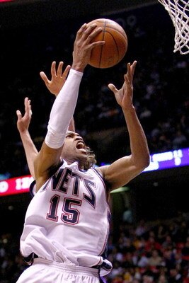 EAST RUTHERFORD, NJ - MARCH 27:  Vince Carter #15 of the New Jersey Nets drives to the basket against the Los Angeles Lakers during their game on March 27, 2009 at the Izod Center in East Rutherford, New Jersey. NOTE TO USER: User expressly acknowledges a