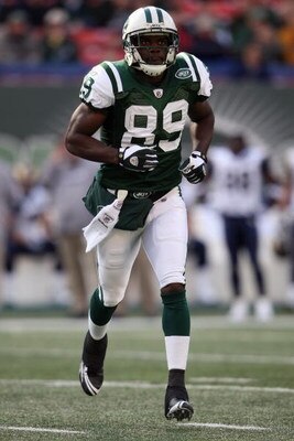 EAST RUTHERFORD, NJ - NOVEMBER 09: Jerricho Cotchery #89 of the New York Jets runs against the St. Louis Rams at Giants Stadium on November 9, 2008 in East Rutherford, New Jersey. (Photo by Nick Laham/Getty Images) 