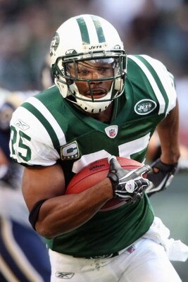 EAST RUTHERFORD, NJ - NOVEMBER 09: Kerry Rhodes #25 of the New York Jets runs the ball against the St. Louis Rams at Giants Stadium on November 9, 2008 in East Rutherford, New Jersey. (Photo by Nick Laham/Getty Images) 