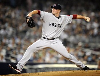 NEW YORK - AUGUST 09:  Jon Lester #31 of the Boston Red Sox delivers to the plate in the first inning against the New York Yankees during their game on August 9, 2009 at Yankee Stadium in the Bronx Borough of New York City.  (Photo by Jeff Zelevansky/Gett