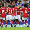 Thomas Vermaelen of Arsenal is congratulated by teammates after scoring his teams second goal during the Barclays Premier League match between Everton and Arsenal at Goodison Park on August 15, 2009 in Liverpool, England. (Photo by Michael Regan/Getty Ima