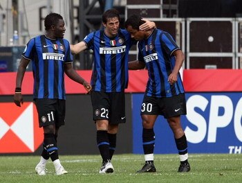 FOXBORO, MA - JULY 26:  Diego Milito #22 of Inter Milan is congratulated by teammates Alessandro Amantino #30 and Sulley Muntari #11 after he scored a goal in the second half against AC Milan on July 26, 2009 during the World Football Challange at Gillett