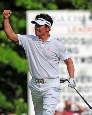 CHASKA, MN - AUGUST 16:  Y.E. Yang of South Korea celebrates after holing out for eagle on the 14th hole during the final round of the 91st PGA Championship at Hazeltine National Golf Club on August 16, 2009 in Chaska, Minnesota.  (Photo by Stuart Frankli