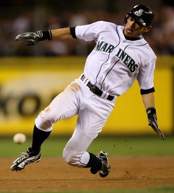 SEATTLE  - AUGUST 15:  Ichiro Suzuki #51 of the Seattle Mariners slides into third base on a steal attempt against the New York Yankees on August 15, 2009 at Safeco Field in Seattle, Washington. Suzuki was out on the play. (Photo by Otto Greule Jr/Getty I
