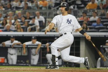 NEW YORK - AUGUST 10: Jorge Posada #20 of the New York Yankees at bat during the game on August 10, 2009 at Yankee Stadium in the Bronx borough of New York City. (Photo by Jared Wickerham/Getty Images) 