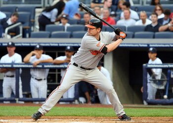 NEW YORK - JULY 20:  Aubrey Huff #17 of the Baltimore Orioles bats against the New York Yankees on July 20, 2009 at Yankee Stadium in the Bronx borough of New York City.  (Photo by Jim McIsaac/Getty Images)