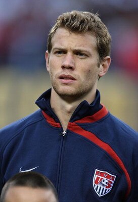 CHICAGO - JUNE 06: Jonathan Spector #12 of the United States stands during player introductions before a FIFA 2010 World Cup Qualifying match against Honduras on June 6, 2009 at Soldier Field in Chicago, Illinois. The United States defeated Honduras 2-1. 