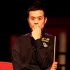 LONDON - JANUARY 13:  Marco Fu from Hong Kong thinks about his next shot during his match against John Higgins of Scotland in the Masters Snooker at Wembley Conference Centre on January 13, 2009 in London, England.  (Photo by Phil Cole/Getty Images)