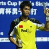 SHANGHAI, CHINA - NOVEMBER 23: (CHINA OUT) Lin Dan of China celebrates with his trophies after winning the men's singles finals badminton match against Chong Wei Lee of Malaysia during the 2008 Li-Ning China Open BWF Super Series on November 23, 2008 in S