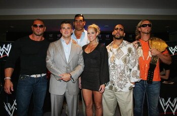 SYDNEY, AUSTRALIA - JUNE 15:  (L-R) WWE World Heavyweight Champion Batista, WWE Executive Vice President Shane McMahon, and WWE wrestlers The Great Khali, Michelle McCool, MVP and Edge pose during the WWE Smackdown Photo Call at the Sheraton on the Park H