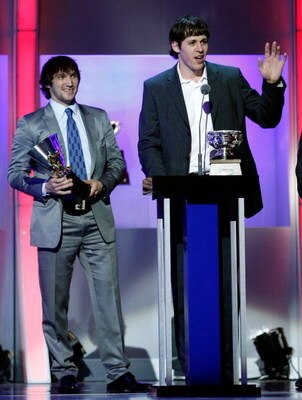 LAS VEGAS - JUNE 18:  Alexander Ovechkin (L) of the Washington Capitals holds the Maurice Richard Trophy as Evgeni Malkin of the Pittsburgh Penguins accepts the Art Ross Trophy during the 2009 NHL Awards at The Pearl concert theater at the Palms Casino Re