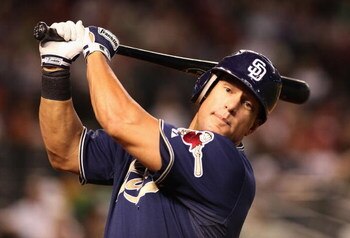 PHOENIX - MAY 26:  Brian Giles #24 of the San Diego Padres warms up on deck during the major league baseball game against the Arizona Diamondbacks at Chase Field on May 26, 2009 in Phoenix, Arizona.  (Photo by Christian Petersen/Getty Images)