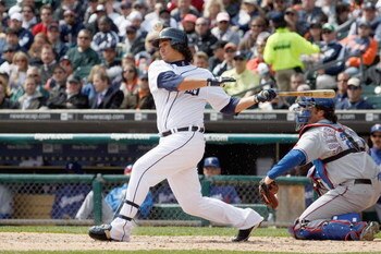 DETROIT - APRIL 10:  Magglio Ordonez #30 of the Detroit Tigers swings at the pitch against the Texas Rangers during Opening Day on April 10, 2009 at Comerica Park in Detroit, Michigan. Detroit won the game 15-2. (Photo by Gregory Shamus/Getty Images)