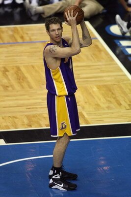 ORLANDO, FL - JUNE 9:  Luke Walton #4 of the Los Angeles Lakers holds the ball against the Orlando Magic in Game Three of the 2009 NBA Finals on June 9, 2009 at Amway Arena in Orlando, Florida.  The Magic won 108-104.  NOTE TO USER:  User expressly acknow