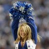 IRVING, TEXAS - DECEMBER 21:  A Dallas Cowboys Cheerlearder dances during the game against the New York Giants at Texas Stadium on December 21, 2003 in Irving, Texas. The Cowboys defeated the Giants 19-3. (Photo by Ronald Martinez/Getty Images)