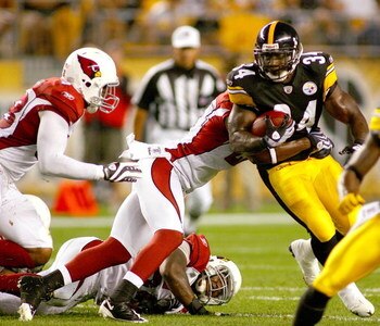 PITTSBURGH - AUGUST 13:  Rashard Mendenhall #34 of the Pittsburgh Steelers runs against the the Arizona Cardinals  on August 13, 2009 at Heinz Field in Pittsburgh, Pennsylvania.  (Photo by Rick Stewart/Getty Images)