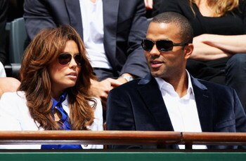PARIS - JUNE 07:  Actress Eva Longoria and her husband, NBA Basketball player Tony Parker watch the action during the Men's Singles Final match Robin Soderling of Sweden and Roger Federer of Switzerland on day fifteen of the French Open at Roland Garros o