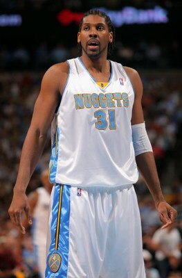 DENVER - MAY 05:  Nene #31 of the Denver Nuggets takes a free throw against the Dallas Mavericks in Game Two of the Western Conference Semifinals during the 2009 NBA Playoffs at Pepsi Center on May 5, 2009 in Denver, Colorado. The Nuggets defeated the Mav