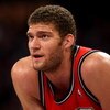 LOS ANGELES, CA - NOVEMBER 25: Brook Loopez #11 of the New Jersey Nets rests during a break in the game against the Los Angeles Lakers on November 25, 2008 at Staples Center in Los Angeles, California. The Lakers won 120-93.   NOTE TO USER: User expressly