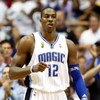 ORLANDO, FL - JUNE 14:  Dwight Howard #12 of the Orlando Magic reacts in the first quarter of Game Five of the 2009 NBA Finals against the Los Angeles Lakers on June 14, 2009 at Amway Arena in Orlando, Florida.  NOTE TO USER:  User expressly acknowledges 