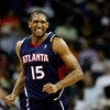 CHARLOTTE, NC - MARCH 06:  Al Horford #15 of the Atlanta Hawks reacts as he runs down the court against the Charlotte Bobcats during their game at Time Warner Cable Arena on March 6, 2009 in Charlotte, North Carolina. NOTE TO USER: User expressly acknowle