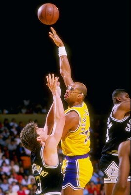 Nov 1987:  Center Kareem Abdul-Jabbar of the Los Angeles Lakers moves the ball during a game against the San Antonio Spurs. Mandatory Credit: Mike Powell  /Allsport