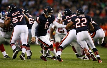 CHICAGO - AUGUST 22: Quarterback Jay Cutler #6 of the Chicago Bears hands the ball off to Matt Forte #22 against the New York Giants during their preseason NFL game at Soldier Field on August 22, 2009 in Chicago, Illinois.  (Photo by Jonathan Daniel/Getty