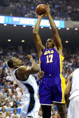ORLANDO, FL - JUNE 14:  Andrew Bynum #17 of the Los Angeles Lakers shoots over Dwight Howard #12 of the Orlando Magic in the first quarter of Game Five of the 2009 NBA Finals on June 14, 2009 at Amway Arena in Orlando, Florida.  NOTE TO USER:  User expres