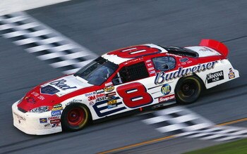 DAYTONA BEACH, FL - FEBRUARY 15: Dale Earnhardt, Jr. driver of the #8 Budweiser Chevrolet Monte Carlo, crosses the finish line on his way toward winning the Daytona 500 on February 15, 2004 at Daytona International Speedway in Daytona Beach, Florida.  (Ph
