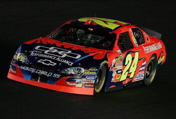 CONCORD, NC - MAY 20:  Jeff Gordon, driver of the #24 DuPont Chevrolet, comes around a turn during the NASCAR Nextel Cup Series All-Star Challenge on May 20, 2006 at Lowe's Motor Speedway in Concord, North Carolina.  (Photo by Streeter Lecka/Getty Images)