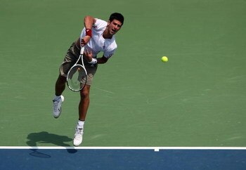 CINCINNATI - AUGUST 19:  Novak Djokovic of Serbia serves against Ivan Ljubicic of Crotia during day three of the Western & Southern Financial Group Masters on August 19, 2009 at the Lindner Family Tennis Center in Cincinnati, Ohio.  (Photo by Nick Laham/G
