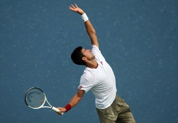 CINCINNATI - AUGUST 19:  Novak Djokovic of Serbia serves against Ivan Ljubicic of Crotia during day three of the Western & Southern Financial Group Masters on August 19, 2009 at the Lindner Family Tennis Center in Cincinnati, Ohio.  (Photo by Nick Laham/G