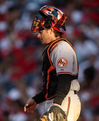 ANAHEIM, CA - JULY 04:  Catcher Gregg Zaun  #9 of the Baltimore Orioles walks to the mound in the game against the Los Angeles Angels of Anaheim on July 4, 2009 at Angel Stadium in Anaheim, California.  (Photo by Stephen Dunn/Getty Images)