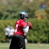 PHILADELPHIA - AUGUST 15:  Michael Vick #7 prepares to throw a pass in a workout at the NovaCare Complex on August 15, 2009 in Philadelphia, Pennsylvania.  (Photo by Len Redkoles/Getty Images)