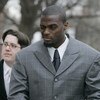 LEBANON - JANUARY 14: New York Giants wide receiver Plaxico Burress winks at a supporter as he arrives at the Lebanon County Courthouse January 14, 2009 in Lebanon, Pa.  Burress is scheduled to appear in a civil trial in a dispute with an automobile deale