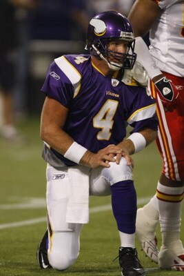 MINNEAPOLIS, MN - AUGUST 21: Quarterback Brett Favre #4 of the Minnesota Vikings gets up after getting hit by a defender against the Kansas City Chiefs at Hubert H. Humphrey Metrodome on August 21, 2009 in Minneapolis, Minnesota. (Photo by Scott Boehm/Get