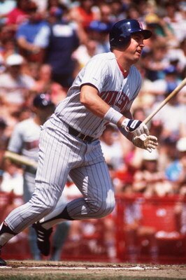 UNDATED:  MINNESOTA FIRST BASEMAN KENT HRBEK LEAVES THE PLATE FOLLOWING A HIT DURING THE TWINS GAME VERSUS THE CHICAGO WHITE SOX. Mandatory Credit: Jonathan Daniel/ALLSPORT
