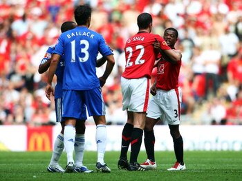 LONDON, ENGLAND - AUGUST 09:  Patrice Evra of Manchester United (R) argues with Michael Ballack of Chelsea following Frank Lampard's goal for Chelsea during the FA Community Shield match between Manchester United and Chelsea at Wembley Stadium on August 9