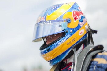 NURBURG, GERMANY - JULY 12:  (EDITORS NOTE A TILT SHIFT LENS WAS USED TO CREATE THIS IMAGE)  Sebastien Bourdais of France and Scuderia Toro Rosso is seen on the grid before the German Formula One Grand Prix at Nurburgring on July 12, 2009 in Nurburg, Germ