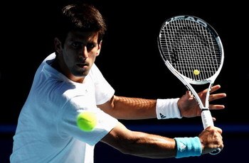 MELBOURNE, AUSTRALIA - JANUARY 18:  Novak Djokovic of Serbia plays a backhand volley during a practice session ahead of the Australian Open 2009 at Melbourne Park on January 18, 2009 in Melbourne, Australia.  (Photo by Quinn Rooney/Getty Images)