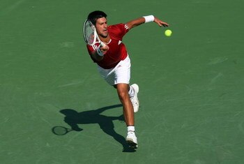 CINCINNATI - AUGUST 21:  Novak Djokovic of Serbia hits a forehand against Gilles Simon of France during day five of the Western & Southern Financial Group Masters on August 21, 2009 at the Lindner Family Tennis Center in Cincinnati, Ohio.  (Photo by Nick 