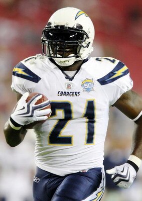 GLENDALE, ARIZONA - AUGUST 22:  LaDainian Tomlinson #21 of the San Diego Chargers carries the bal during the pre game warm up against  the Arizona Cardinals at the University of Phoenix Stadium on August 22, 2009 in Glendale, Arizona. (Photo by Christian 