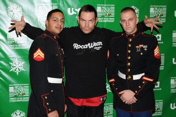 NEW YORK - DECEMBER 18:   (L-R) Marine Cpl. Guilbe, wrestler Jeff Hardy and Marine Sgt. Lahey attend the WWE and USA Network help U.S Marine Corp Toys for Tots Foundation event at the NBC Experience store on December 18, 2007 in New York City.  (Photo by 