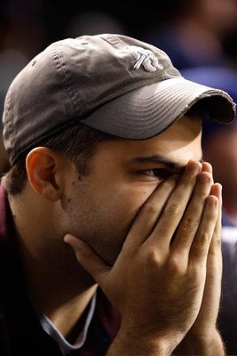 CHICAGO - OCTOBER 02:  Michael Piper, a fan of the Chicago Cubs looks on dejected against the Los Angeles Dodgers in Game Two of the NLDS during the 2008 MLB Playoffs at Wrigley Field on October 2, 2008 in Chicago, Illinois.  (Photo by Jamie Squire/Getty 
