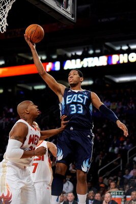PHOENIX - FEBRUARY 15:  Danny Granger #33 of the Eastern Conference lays the ball up over David West #30 of the Western Conference during the 58th NBA All-Star Game, part of 2009 NBA All-Star Weekend at US Airways Center on February 15, 2009 in Phoenix, A
