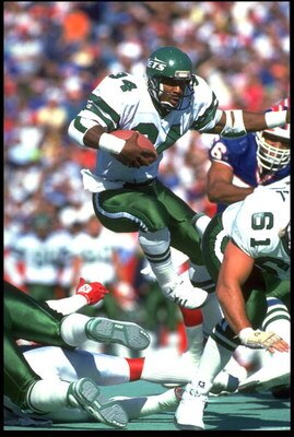 21 Oct 1991: JOHNNY HECTOR, #34, RUNNING BACK FOR THE NEW YORK JETS, LEAPS THROUGH THE LINE OF SCRIMMAGE DURING THEIR 30-27 LOSS TO THE BUFFALO BILLS AT RICH STADIUM IN ORCHARD PARK, NEW YORK.
