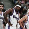 SACRAMENTO, CA - NOVEMBER 19:  Peja Stojakovic #16 of the Sacramento Kings stands next to his teammates Chris Webber #4 and Mike Bibby #10 during the game against the Memphis Gizzlies at Arco Arena on November 19, 2004 in Sacramento, California.  The King