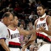 PORTLAND, OR - NOVEMBER 13:  Rasheed Wallace #30 of the Portland Trail Blazers argues with the referee as teammate Damon Stoudamire #3 holds him back during a NBA game against the Sacramento Kings November 13, 2003 at the Rose Garden in Portland, Oregon. 