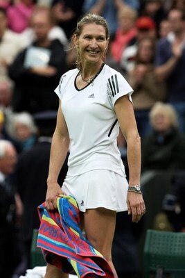 LONDON, ENGLAND - MAY 17:  Steffi Graf looks on during the Ladies Singles match against Kim Clijsters during the 'Centre Court Celebration' at Wimbledon on May 17, 2009 in London, England.  (Photo by Hamish Blair/Getty Images)