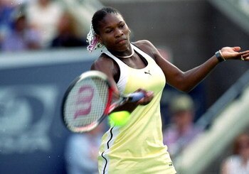 11 Sep 1999:  Serena Williams of the USA hits the ball during the match between Martina Hingis of Switzerland in the US Open at the USTA National Tennis Center in Flushing Meadows, New York. Williams defeated Hingis 6-3, 7-6 (7-4). Mandatory Credit: Jamie